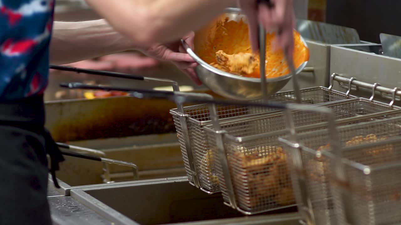 Wings Coming Out Of The Deep Fryer