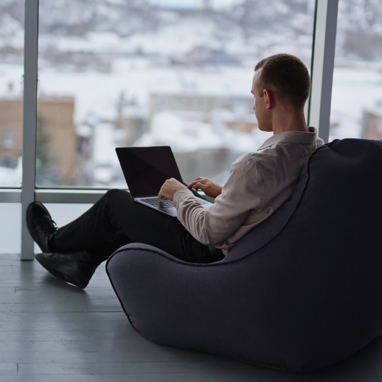 Professional successful man in modern office. Confident business man working with phone