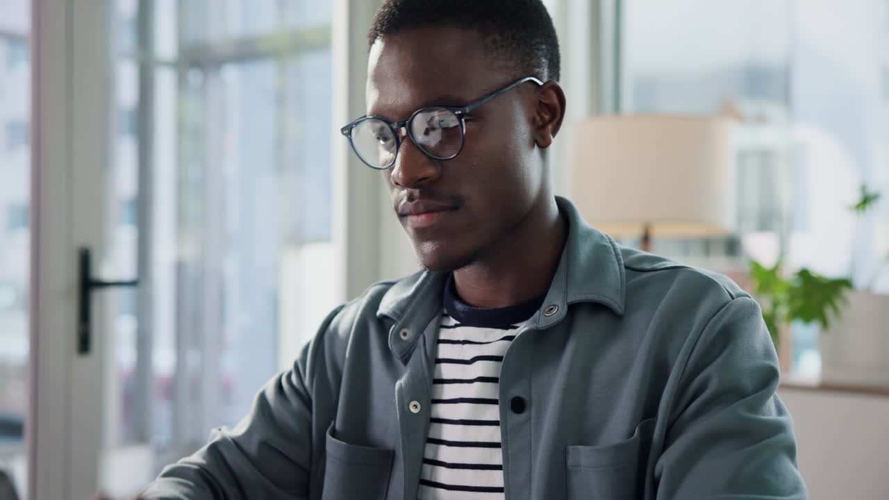 A man experiencing eyestrain and fatigue