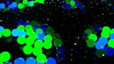 las bombillas comienzan a brillar formando un patrón como una guirlanda de navidad abstracta. las ondas verdes corren a través de las bolas como en la guirlana de navidad, un fondo en bucle abstracto en 3d con muchas esferas grises en el plano.