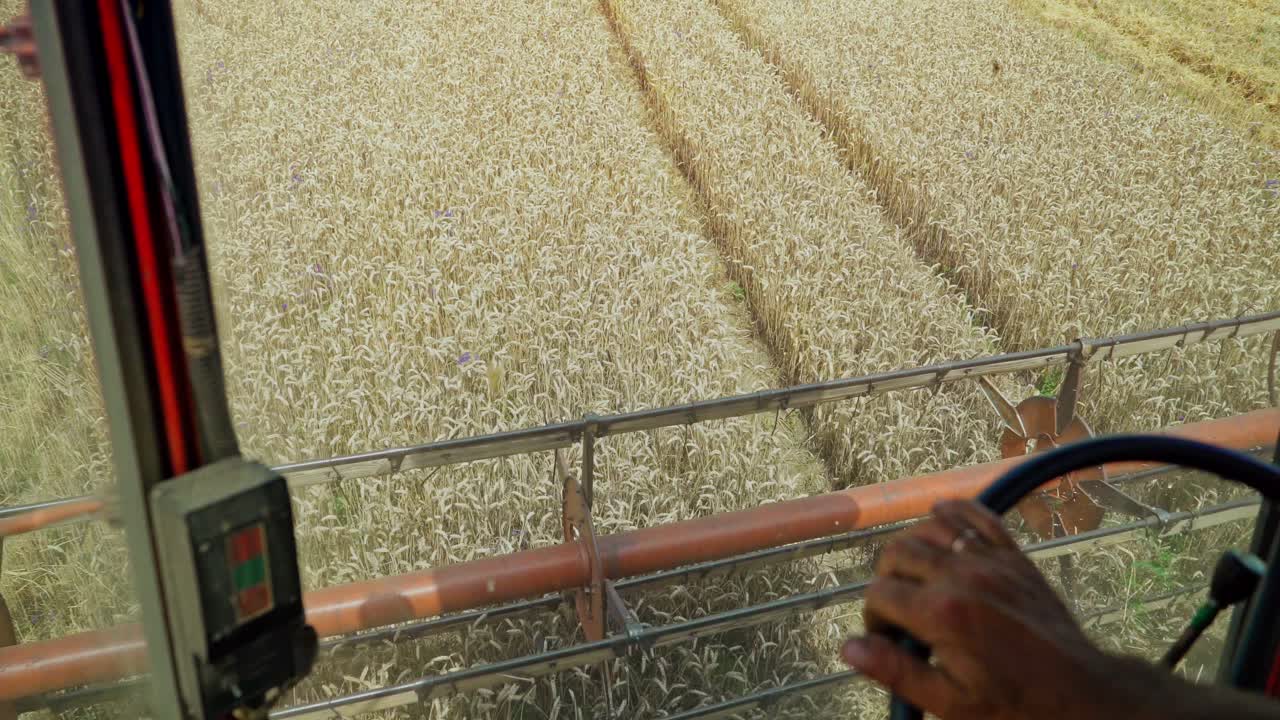Close up of the cutting blades on a wheat harvesting combine. Wheat harvester