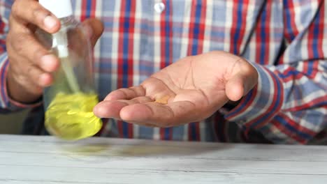 man washing hands with soap