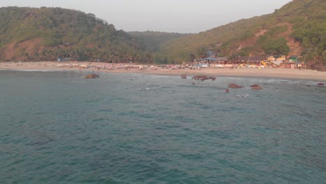 4k footage flying in from the coast to the beautiful beaches of arambol village, india. a place for alternative therapies studies, this village is a popular with travelers from all over the world.