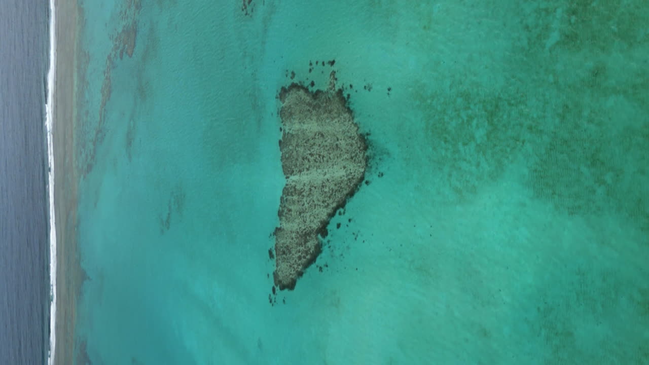 Vertical aerial parallax over Po&eacute;'s Heart off Po&eacute; Beach, New Caledonia