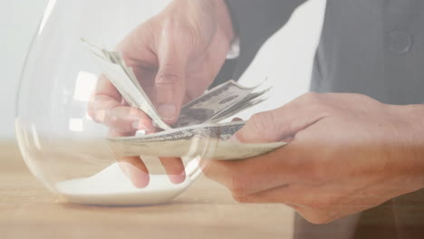 animación de un hombre caucásico contando billetes sobre un reloj de arena