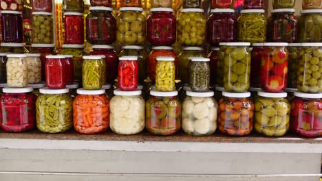 jars of pickled vegetables in a turkish market