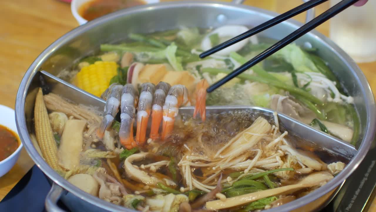 4k video of the hotpot shabu shabu full with vegetable and meat. Japanese asian food concept