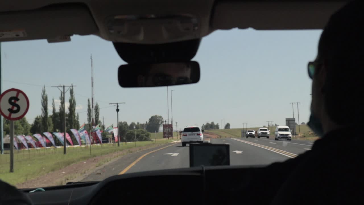 Driver's perspective as they go along the congested N4 Highway in South Africa in direction of Kruger National Park.