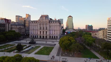 Aerial-view-establishing-the-microcenter-of-Buenos-Aires-with-people-walking-freely,-in-front-of-the-Kirchner-Cultural-Center