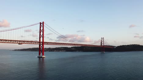 from far to near, the red bridge in lisbon