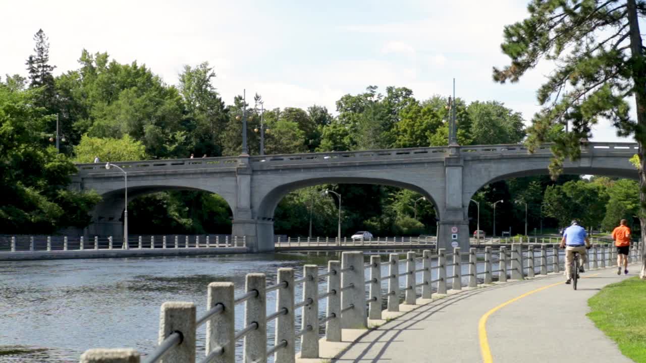 Rideau Canal sunny day people running