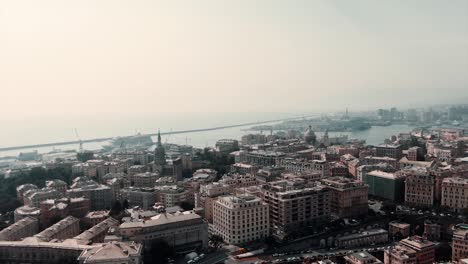 Panoramic-View-Of-Skyscraper-At-Genoa-Port-City-In-Italy-Region-Of-Liguria-During-Misty-Morning