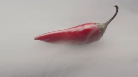 red chili pepper in smoke