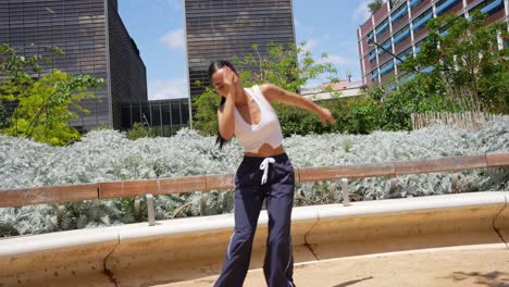 woman dancing in urban park