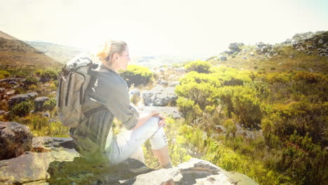 woman hiking with nature transition