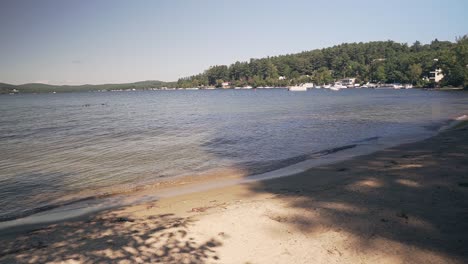 Panning-shot-of-water-at-Winnipesaukee-Lake-in-the-White-Mountains-of-New-Hampshire