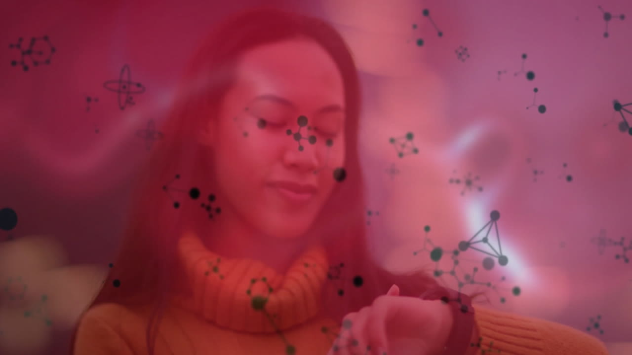 Woman examining smartwatch in technology scene, with floating molecular network graphics overlay