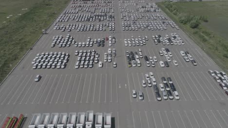 aerial view of new car storage parking lot. car park view from above.