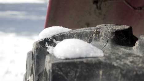 snowy tire on heavy machinery