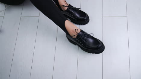 black platform lace-up ankle boots