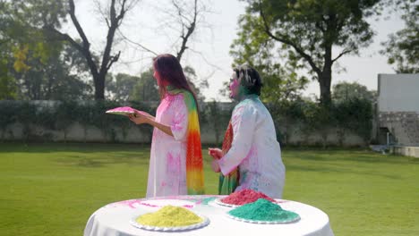 indian man surprises his wife on holi