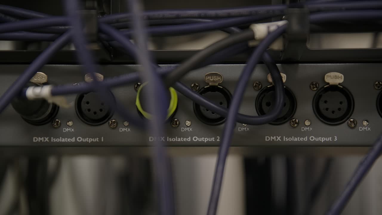 Blinking LED Lights with DMX Cables Plugged into Audio Device