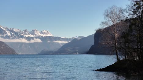 snowy mountains and lake landscape