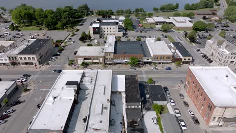 downtown cadillac, michigan with drone video moving sideways close up