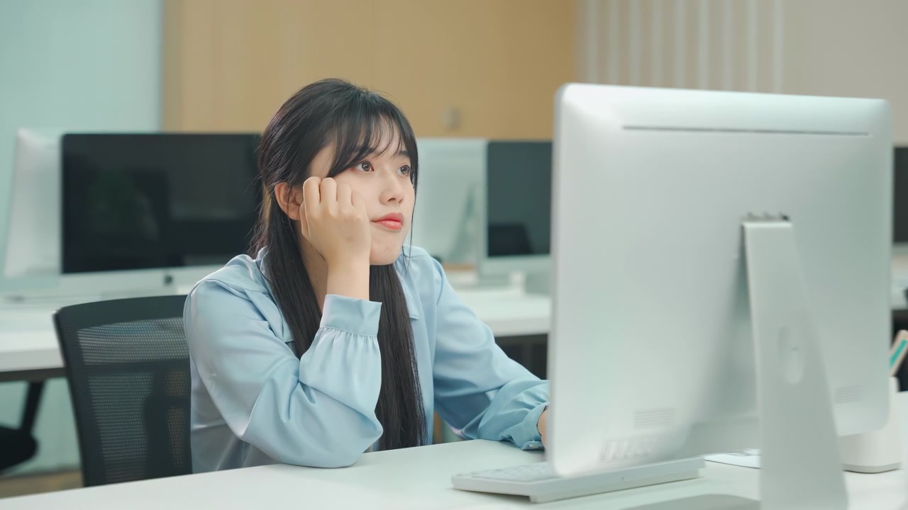 Creative and idea crisis, boring young businesswoman having long work day on laptop computer looking away thinking with lack of motivation and concentration, experiencing stress and burnout