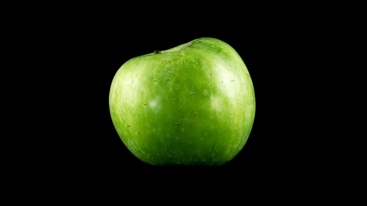 Æble på sort baggrund.