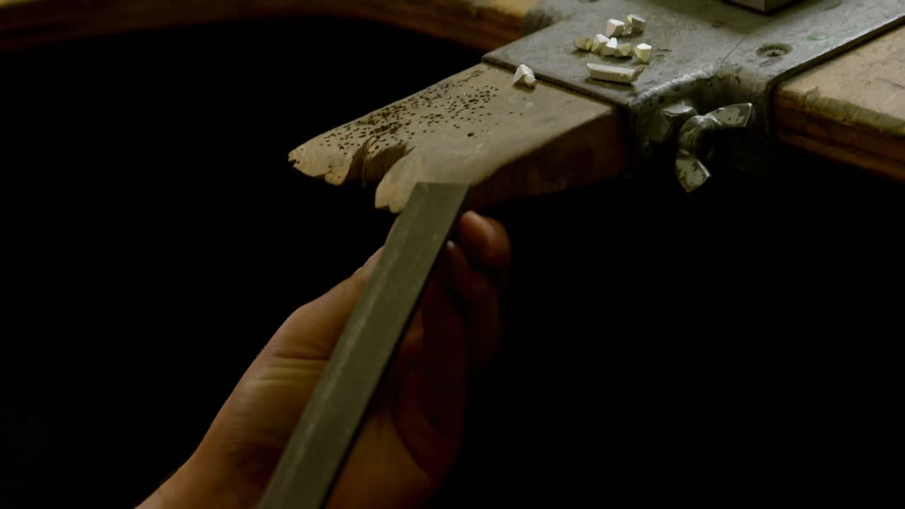 Jewelry designer making jewelry in workshop 4k