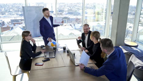 young colleagues sitting at the business meeting in the office. brainstorming at the office.