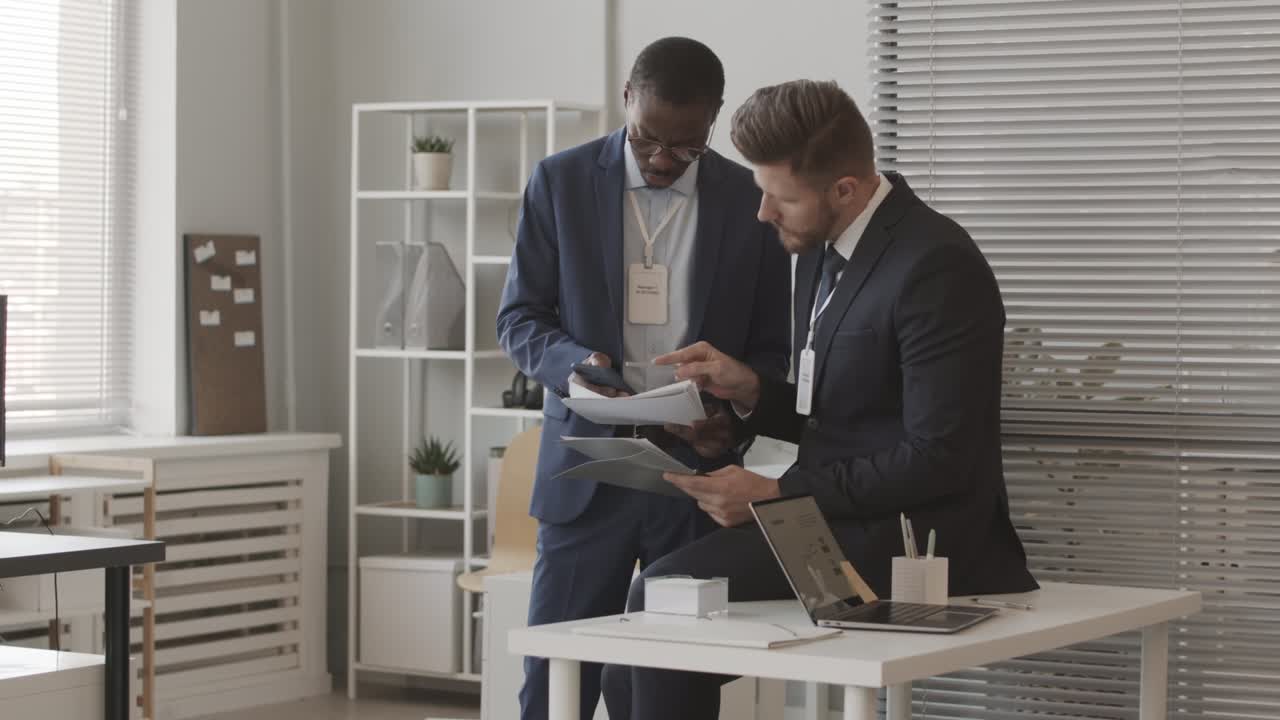 Investment Managers Developing Trading Strategy in Office
