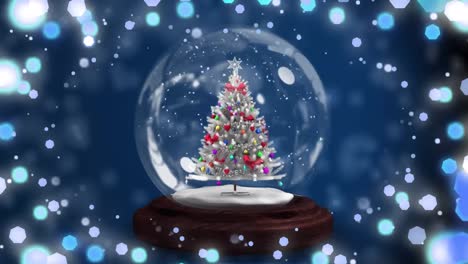 animación del globo de nieve de navidad con árbol de navidad sobre fondo azul