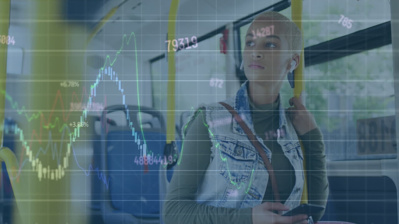 Animation of graphs, changing numbers, biracial woman wearing headphone and listening music on bus