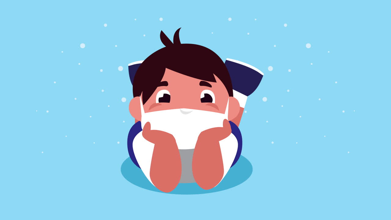 의료 마스크를 착용 한 작은 학생 소년