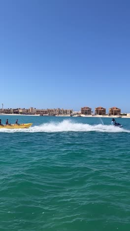 a view of a jet ski in asea, close up shot, insert shot, trucking shot