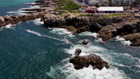 drone hyperlapse past gearing's point above cliffs, scenic hermanus