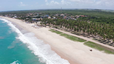 AERIAL---Porto-de-Galinhas-beach,-Ipojuca,-Brazil,-forward-lowering-circle-pan