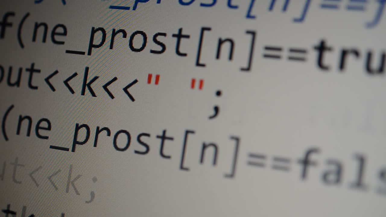 Source code on the monitor screen. Source code