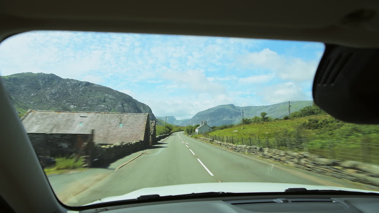 Long Drive, driving Through The Scenic Landscapes Of Snowdonia National Park In Wales - Long Shot