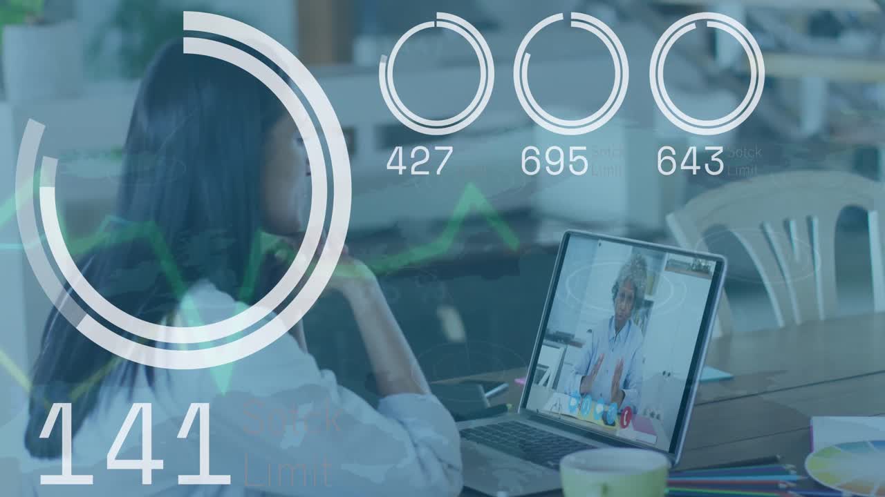 Animation of data processing against biracial woman having a videocall on laptop at office