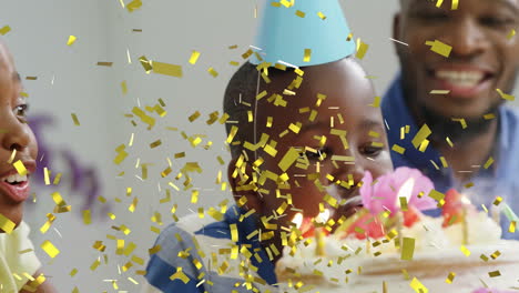 golden confetti animation over children celebrating birthday with cake and candles