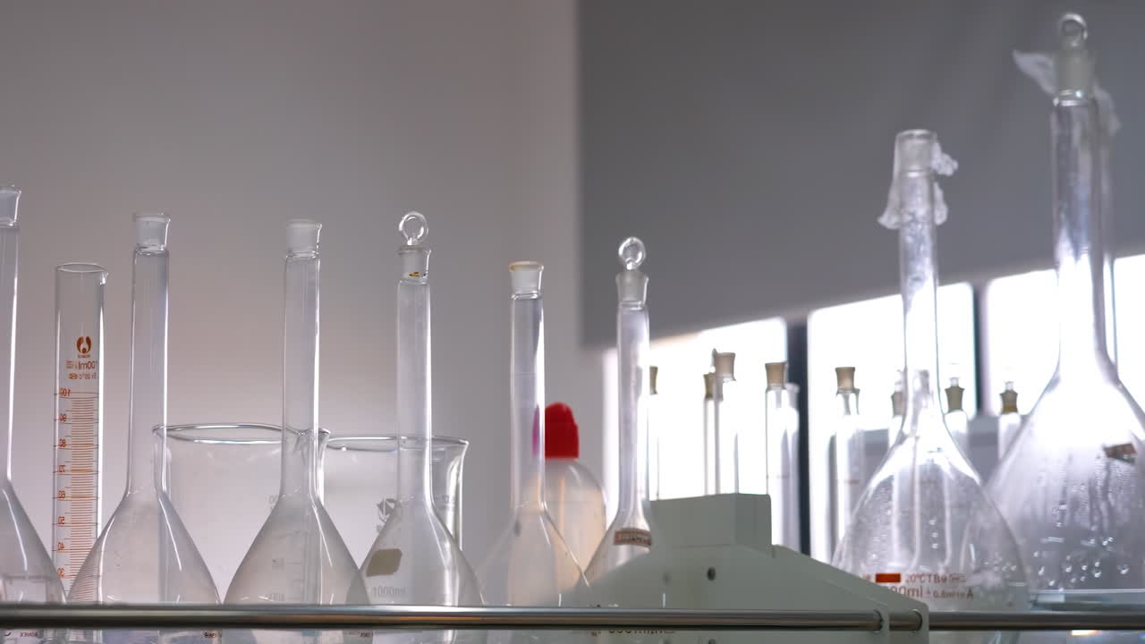 Realistic Flask Laboratory Equipment in Laboratory. Scientific Glass tubes, flasks, burner and beaker for chemicals lab test experiment