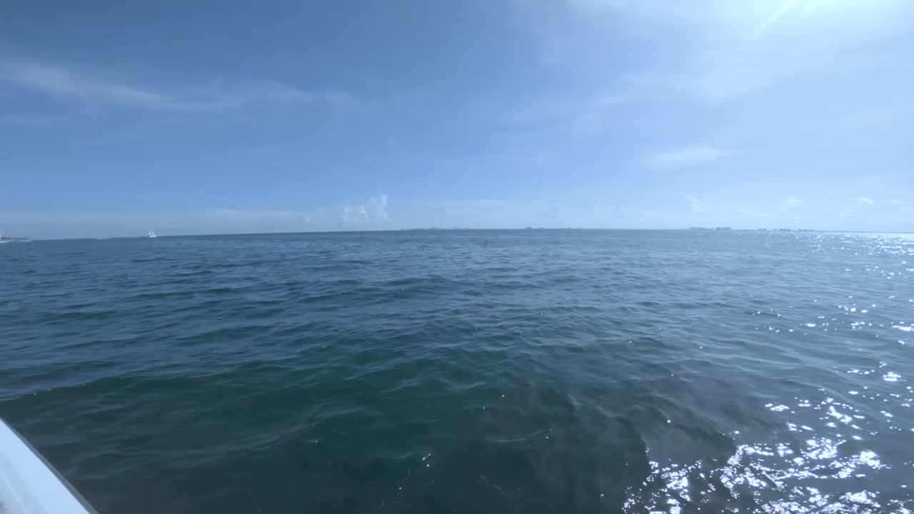 Sailing the blue and crystal clear waters of the Caribbean Sea in Isla Mujeres in Mexico
