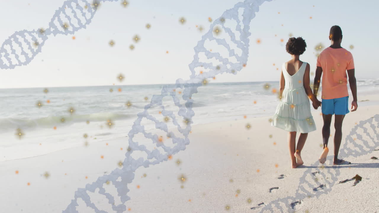 Par går på stranden med DNA-streng og partikelanimation overlejret.