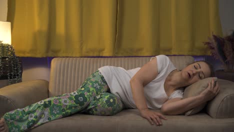 Tired woman jumping on bed.