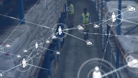 animación de una red de iconos digitales contra un trabajador afroamericano caminando en un almacén