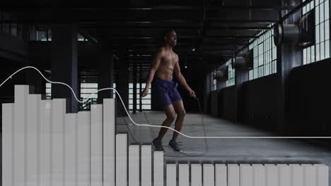 jumping rope, man in industrial space with fitness animation graph overlay