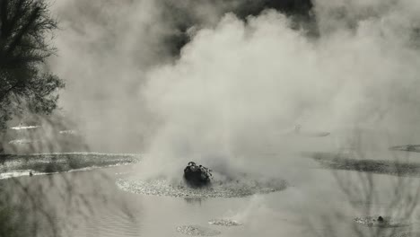 Boiling-hot-geothermal-volcanic-mud-pool,-closeup-shot-steamy-lake-bubbling-mud-and-steam